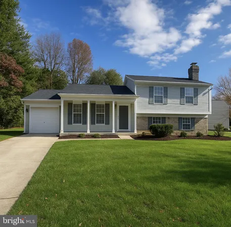 a front view of a house with a garden and porch