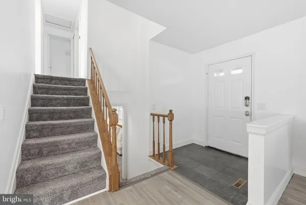 a view of an entryway with staircase