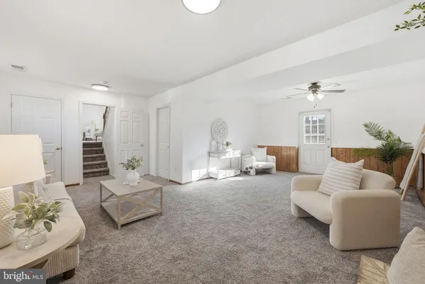 a living room with furniture and a couch