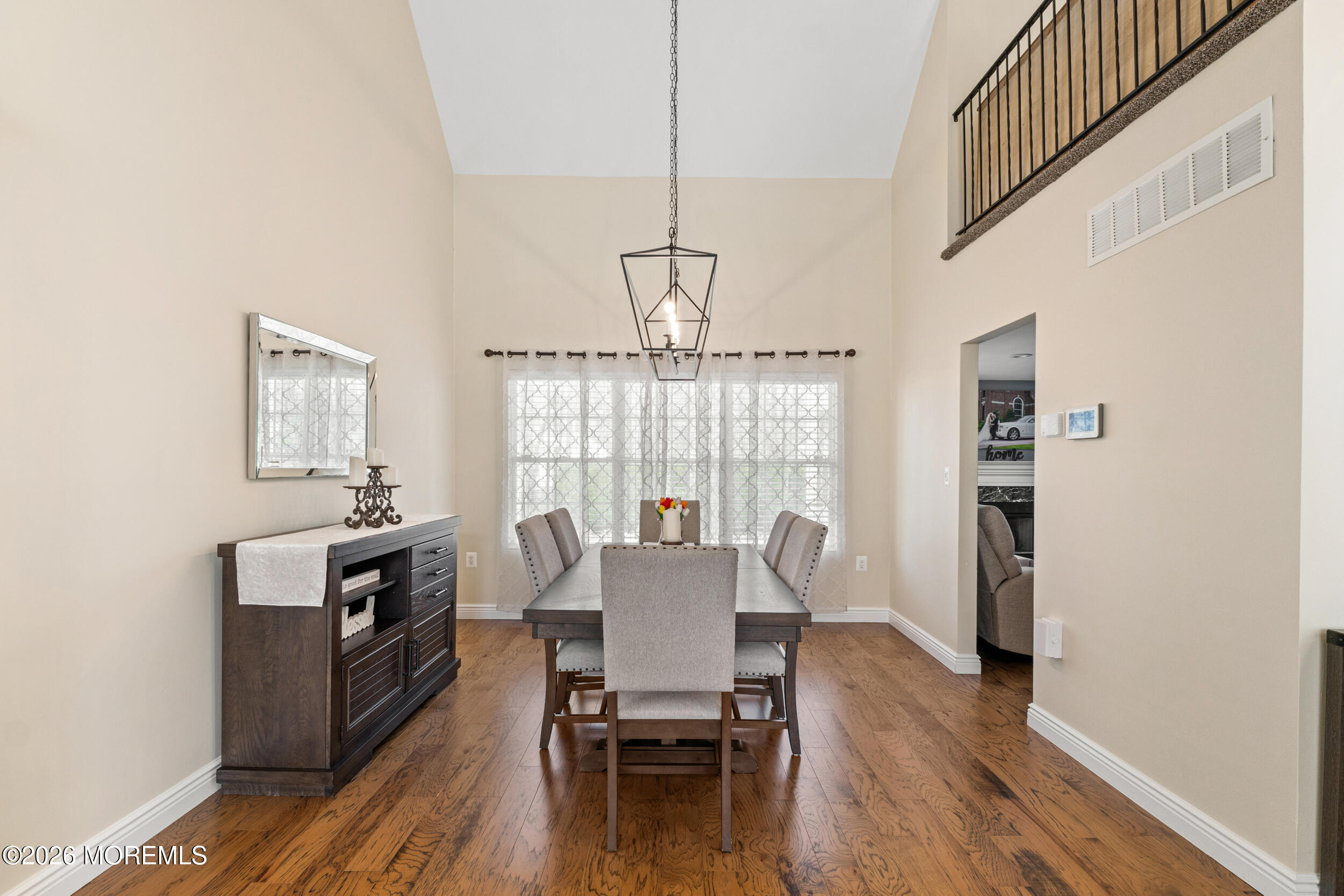 126 Wainwright Drive Old Bridge, NJ 07747 - Photo 11 of 54 a view of a dining room with furniture window and wooden floor