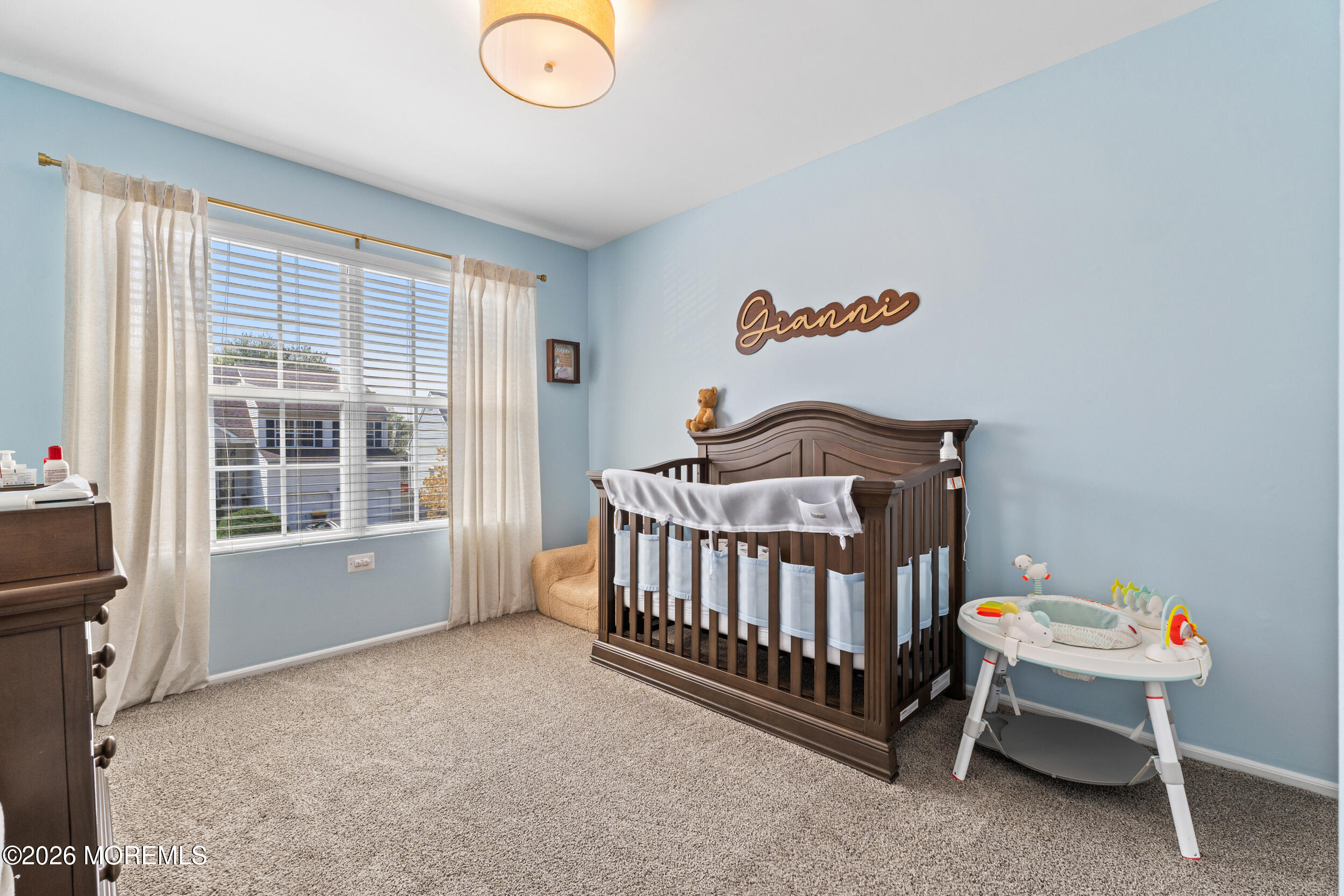 126 Wainwright Drive Old Bridge, NJ 07747 - Photo 28 of 54 a bedroom with a bed and a window