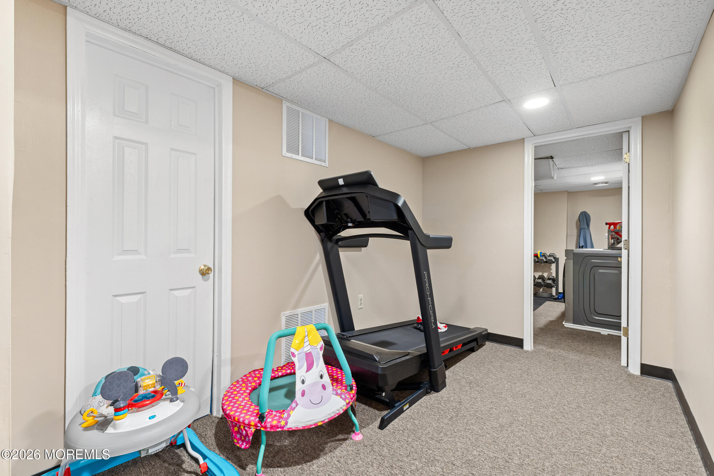 126 Wainwright Drive Old Bridge, NJ 07747 - Photo 41 of 54 a view of play room with gym equipment
