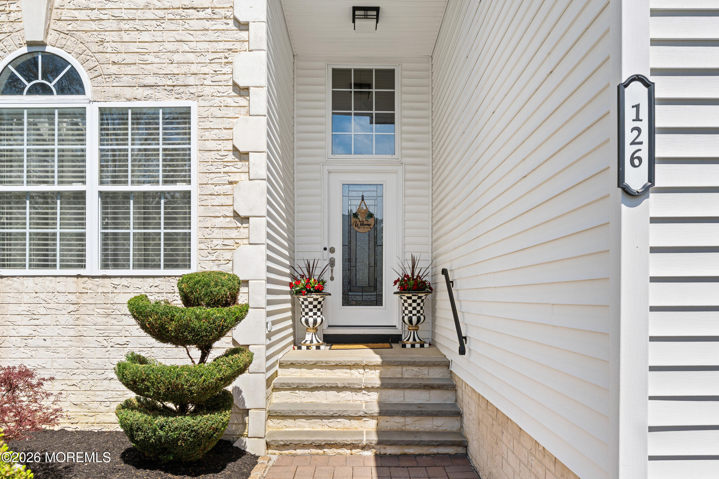 126 Wainwright Drive Old Bridge, NJ 07747 - Photo 5 of 54 a view of a house with a potted plant and a large windows