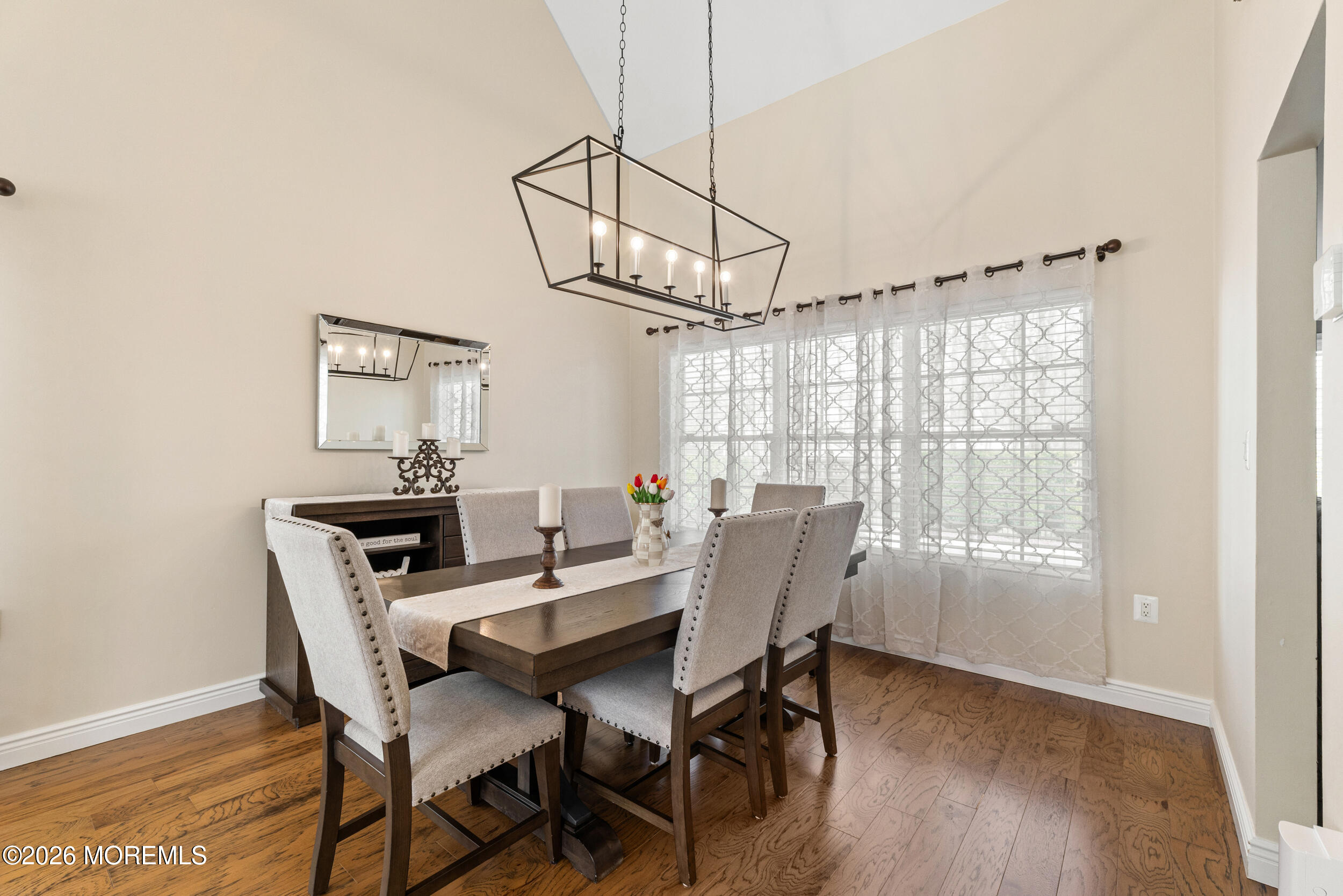 126 Wainwright Drive Old Bridge, NJ 07747 - Photo 10 of 54 a view of a dining room with furniture window and wooden floor