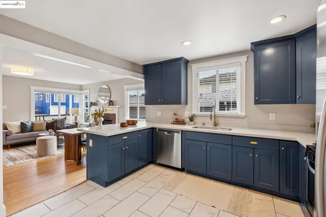 a living room with furniture rug and window
