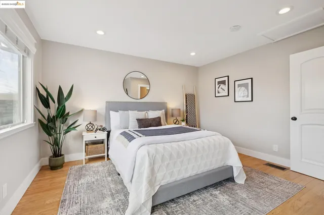 a view of a workspace with furniture and a potted plant