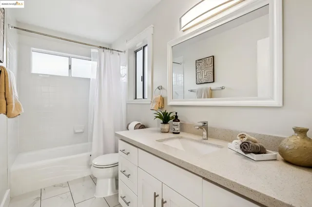 a bedroom with a bed and a table