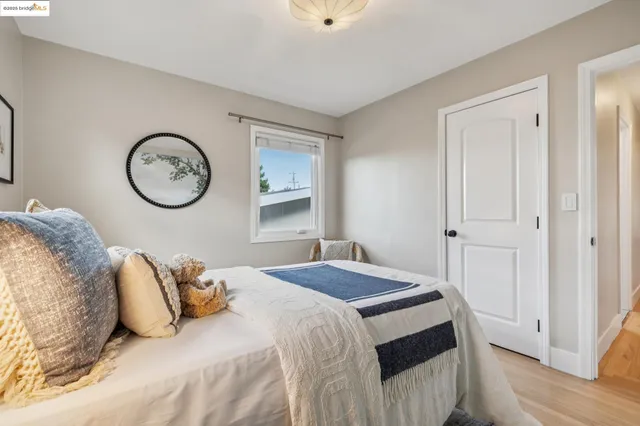 a bedroom with furniture and a table