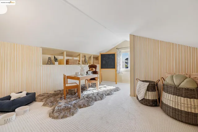 a view of a backyard with large trees