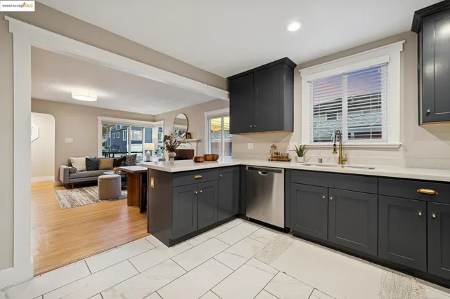 a bedroom with a large bed and a large window