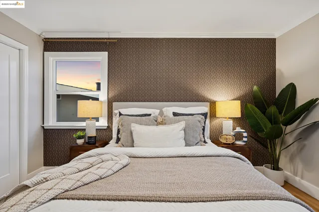 a view of a patio with couches table and chairs and potted plants