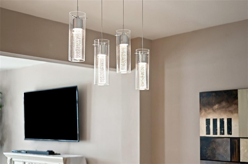 141 Lewisham Road Cranberry Township, PA 16066 - Photo 15 of 50 Crystal cylinder pendants sparkle over the dining room table adding a touch of pure elegance.