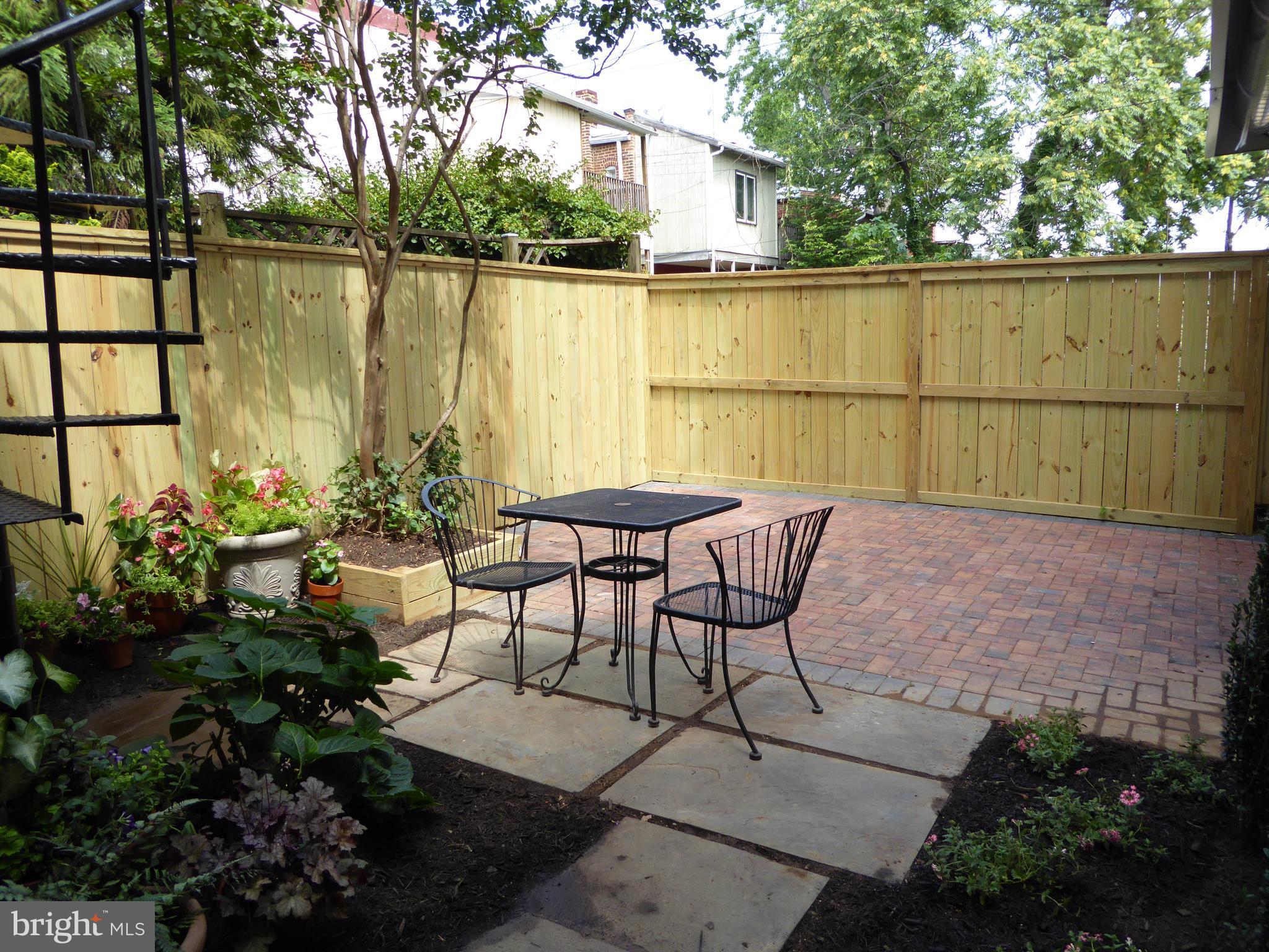 712 F Street Northeast Washington, DC 20002 - Photo 12 of 30 DINING TERRACE WITH FLOWER BEDS