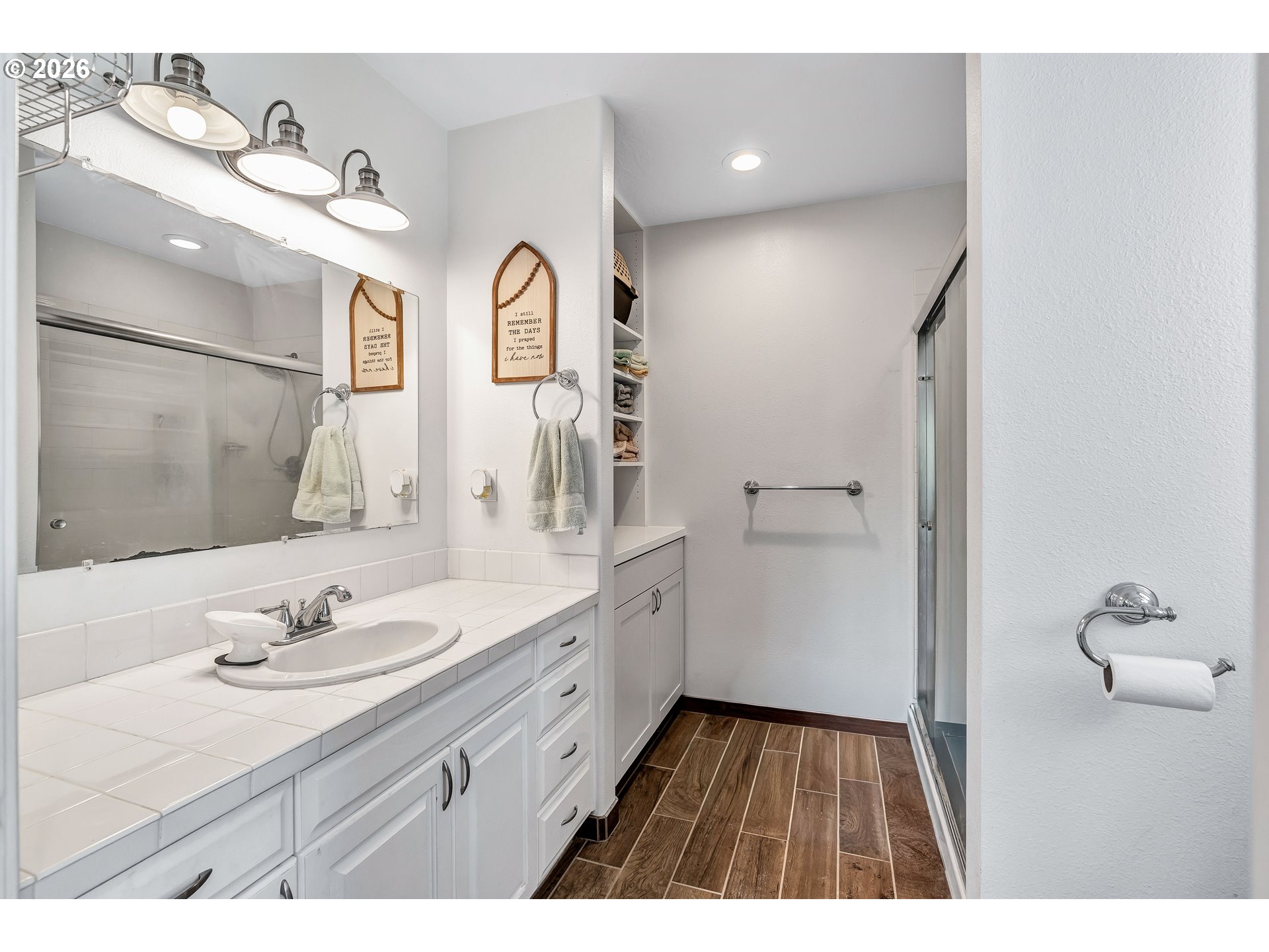 12313 South Groshong Road Molalla, OR 97038 - Photo 24 of 48 a bathroom with a sink and a mirror