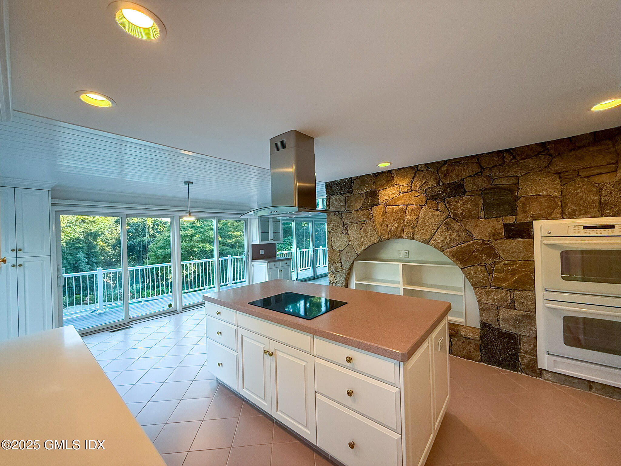 21 Harkim Road Greenwich, CT 06831 - Photo 13 of 40 a kitchen with sink and cabinets