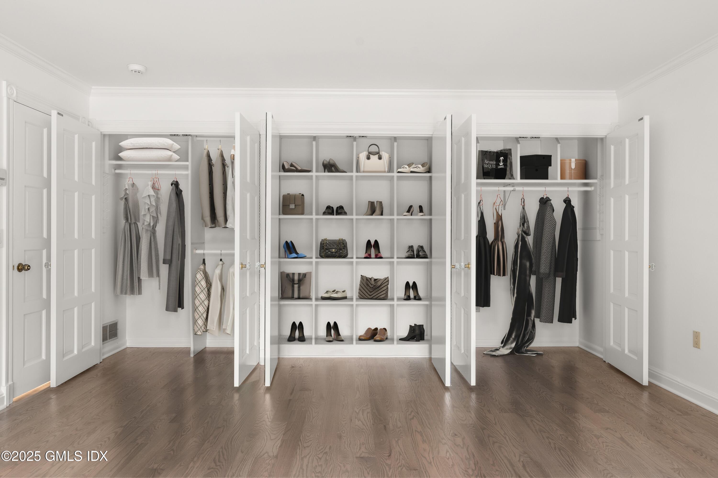 21 Harkim Road Greenwich, CT 06831 - Photo 29 of 40 a view of a hallway with wooden floor and windows