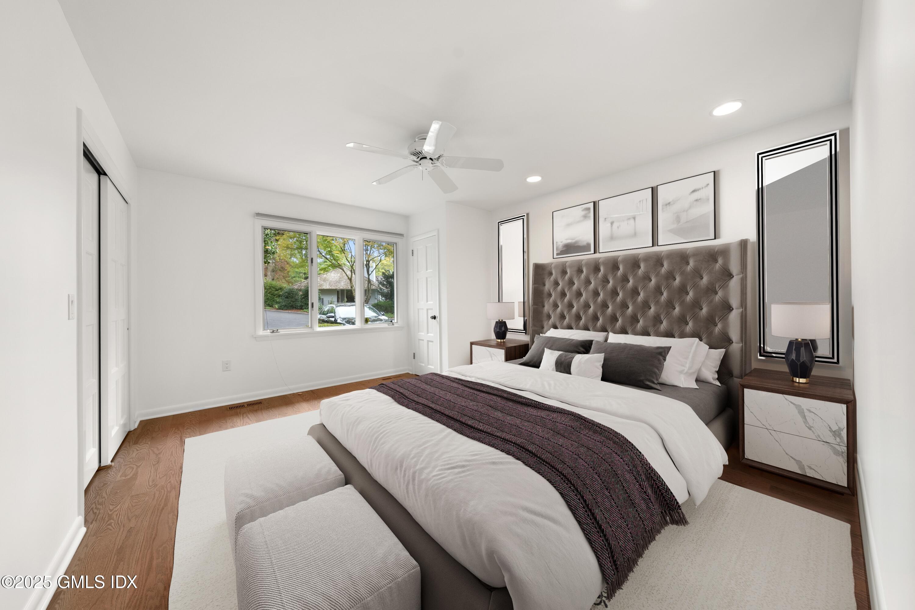 21 Harkim Road Greenwich, CT 06831 - Photo 33 of 40 a bedroom with a large bed and a window