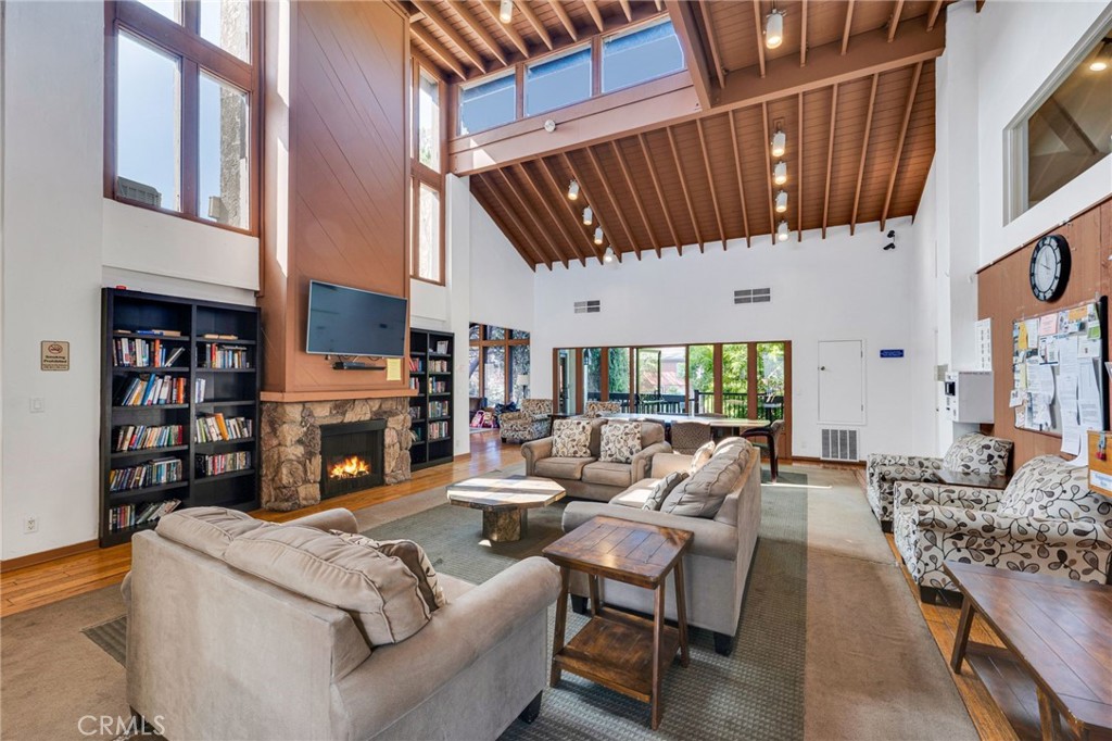 11108 Summertime Lane Culver City, CA 90230 - Photo 19 of 35 a living room with furniture a fireplace and a wooden floor