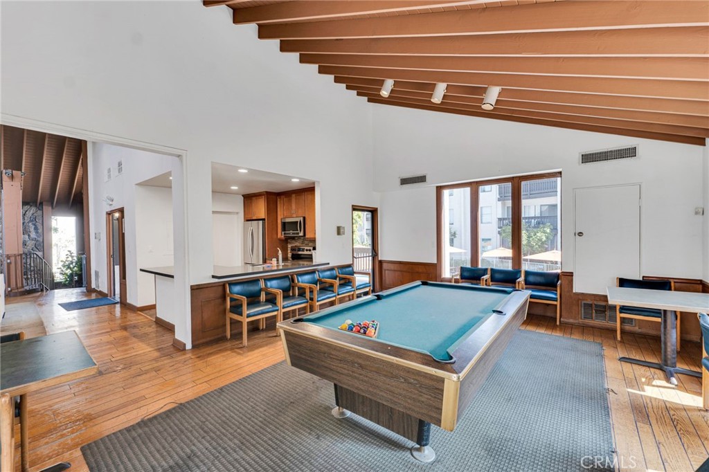 11108 Summertime Lane Culver City, CA 90230 - Photo 20 of 35 a living room with furniture a dining table and chairs with wooden floor