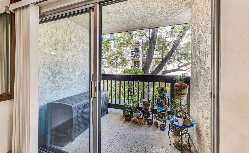 11108 Summertime Lane Culver City, CA 90230 - Photo 3 of 35 a view of a room with furniture and floor to ceiling window
