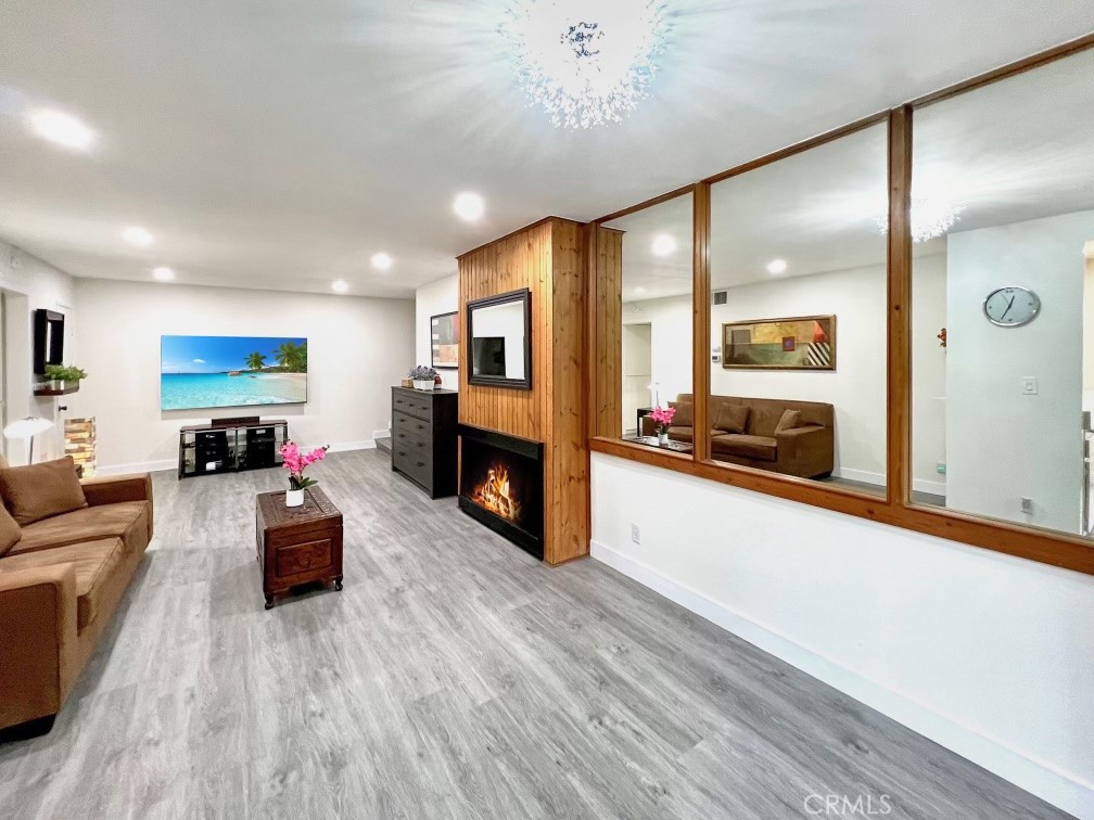 11108 Summertime Lane Culver City, CA 90230 - Photo 7 of 35 a living room with furniture kitchen view and a fireplace