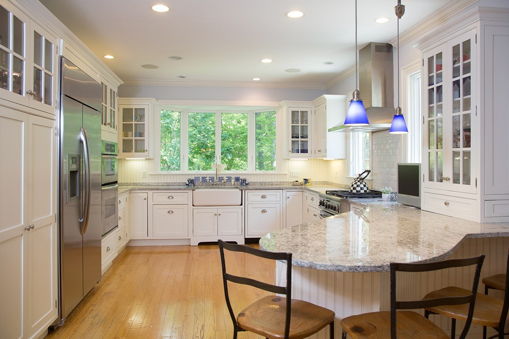 73 Smith Street Wellesley, MA 02482 - Photo 2 of 9 a kitchen with sink refrigerator and large window