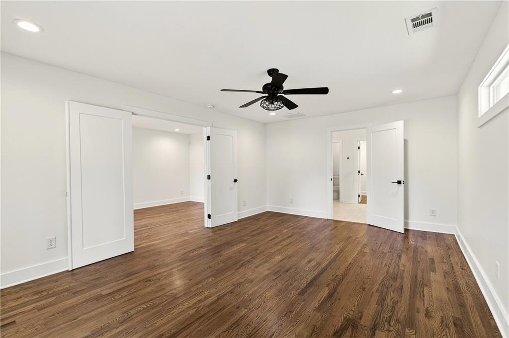 1344 Midlawn Drive Decatur, GA 30032 - Photo 53 of 87 a view of empty room with wooden floor