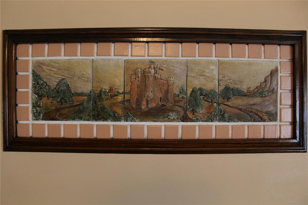 207 Richbarn Road Pittsburgh, PA 15212 - Photo 12 of 12 A unique piece of art displayed over the mantle in the living room is included with the home.