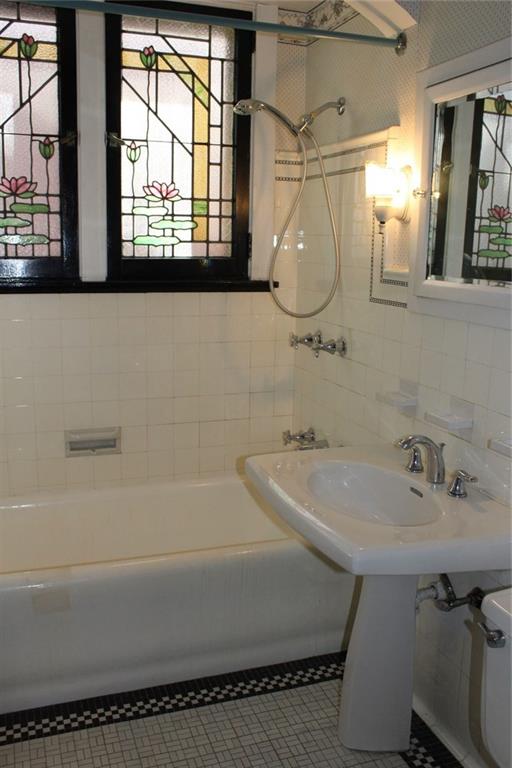 207 Richbarn Road Pittsburgh, PA 15212 - Photo 5 of 12 You will be impressed with the full bathroom with subway and ceramic tile and stained glass windows.