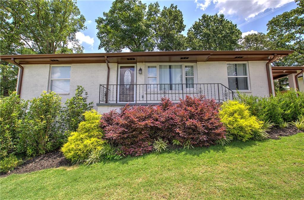 2646 Rockcliff Road Southeast Atlanta, GA 30316 - Photo 1 of 1 a view of a house with a garden