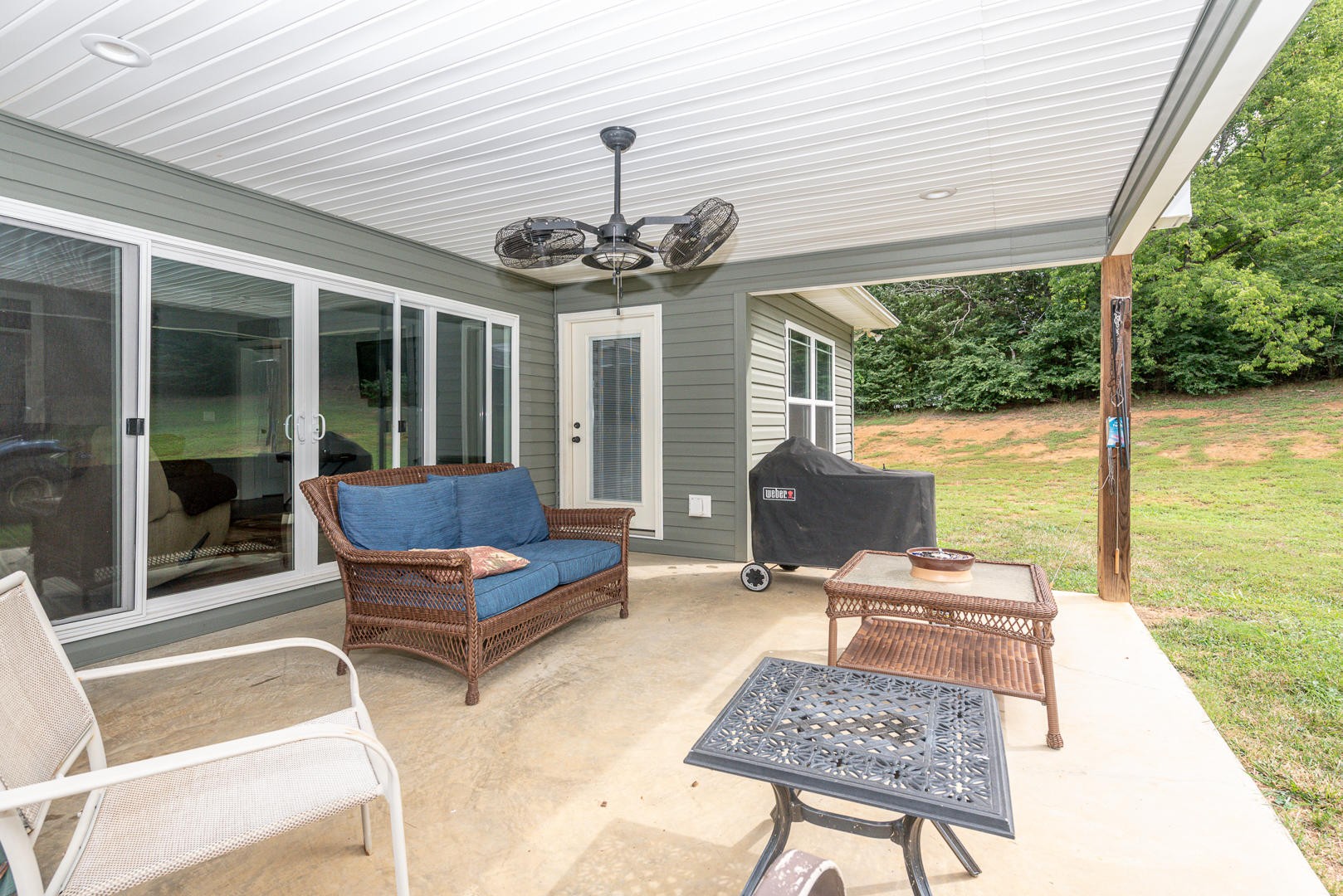 7299 Niles Ferry Road Greenback, TN 37742 - Photo 8 of 38 a outdoor space with the couches and dining table