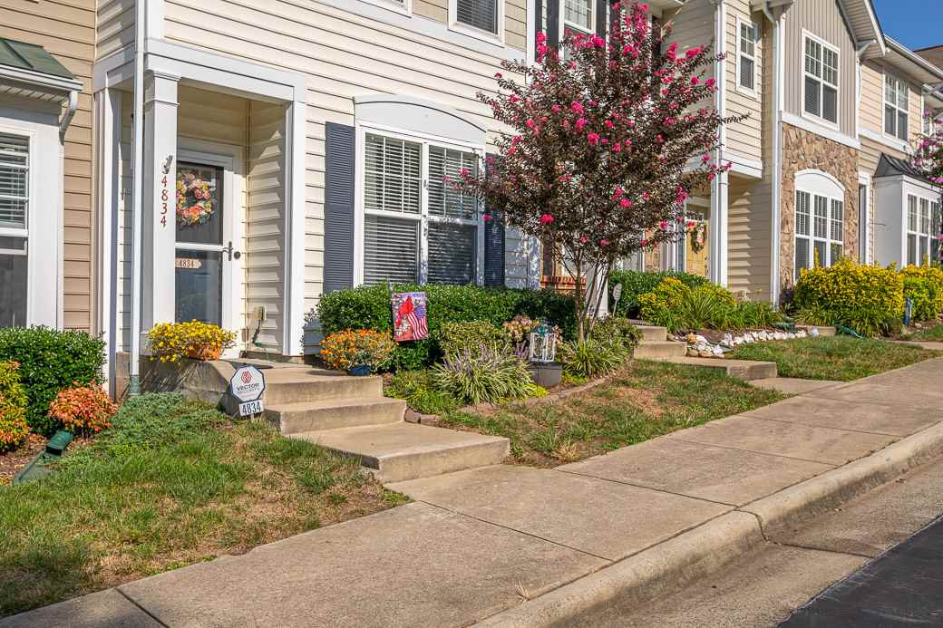 Beautifully landscaped and has two assigned parking spaces. Exterior Front