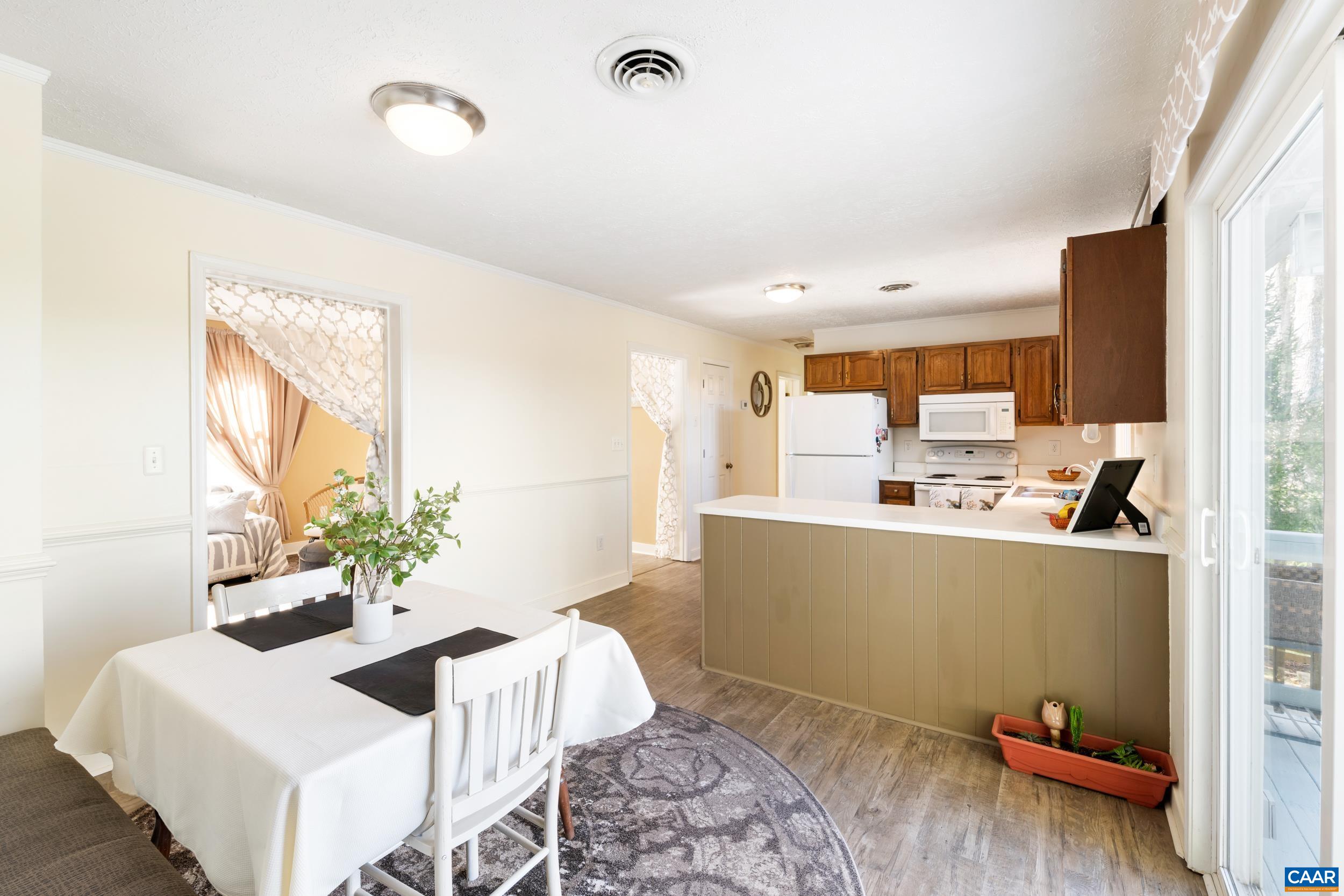 518 Jester Lane Charlottesville, VA 22911 - Photo 13 of 53 a living room with furniture and a table