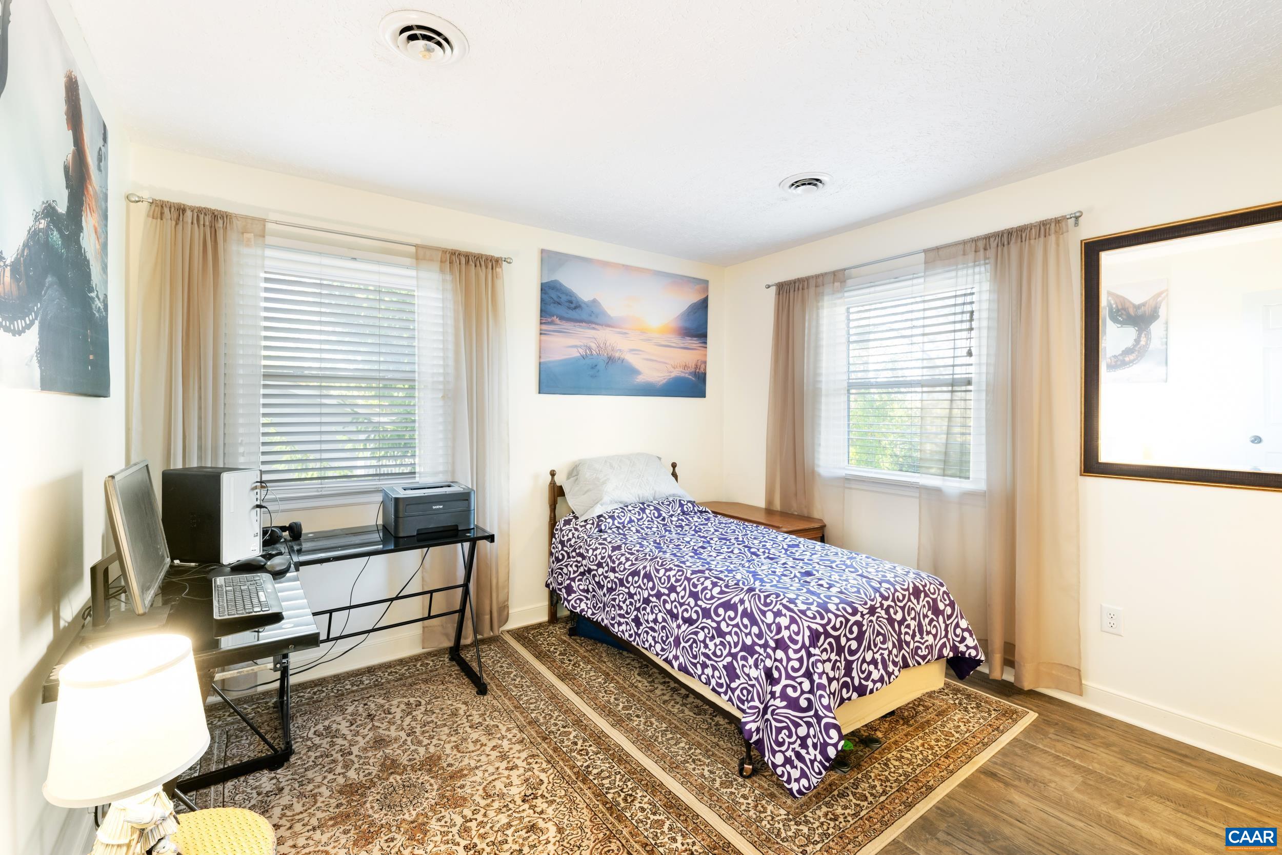 518 Jester Lane Charlottesville, VA 22911 - Photo 21 of 53 a living room with furniture and a window