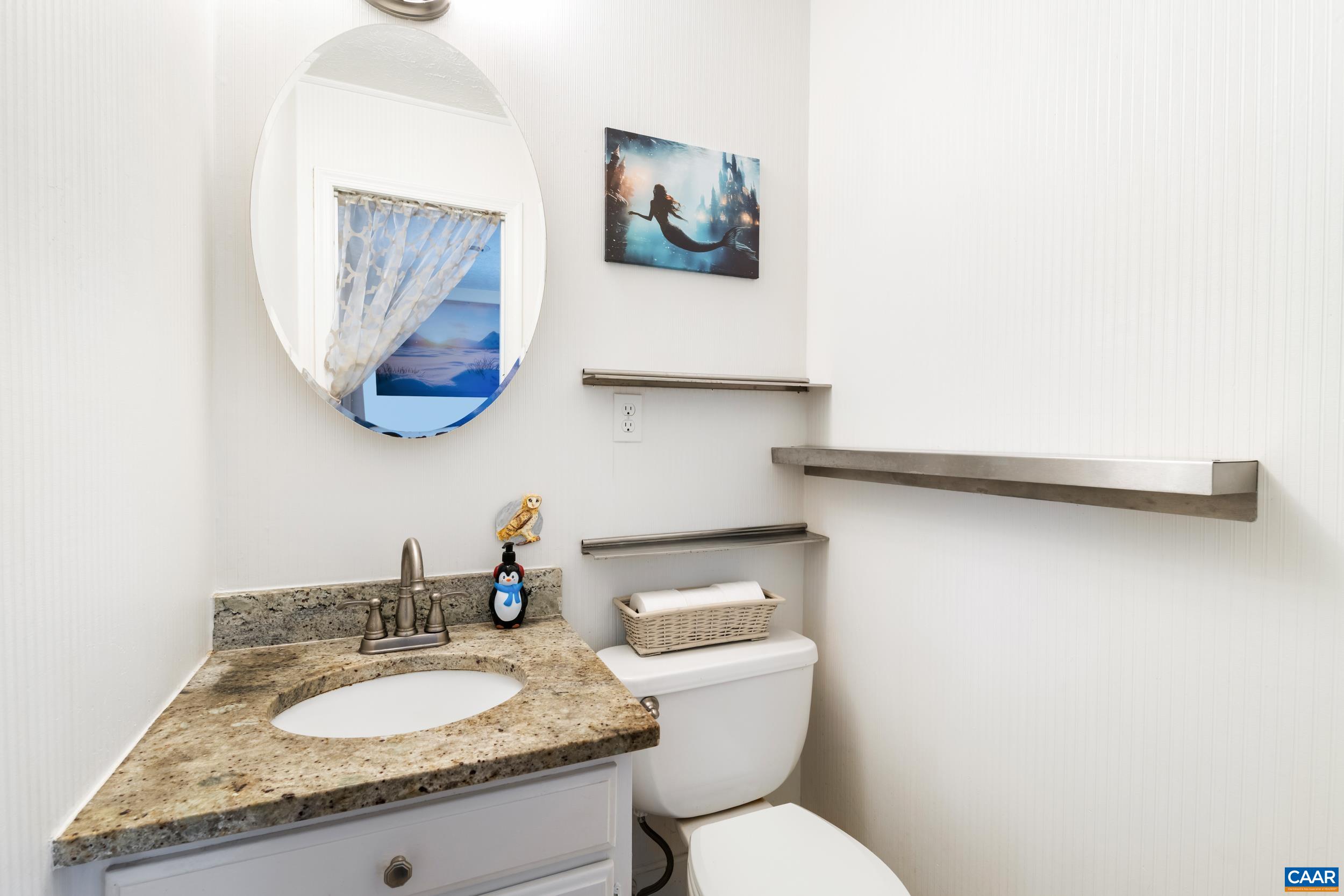518 Jester Lane Charlottesville, VA 22911 - Photo 23 of 53 a bathroom with a granite countertop sink and a mirror