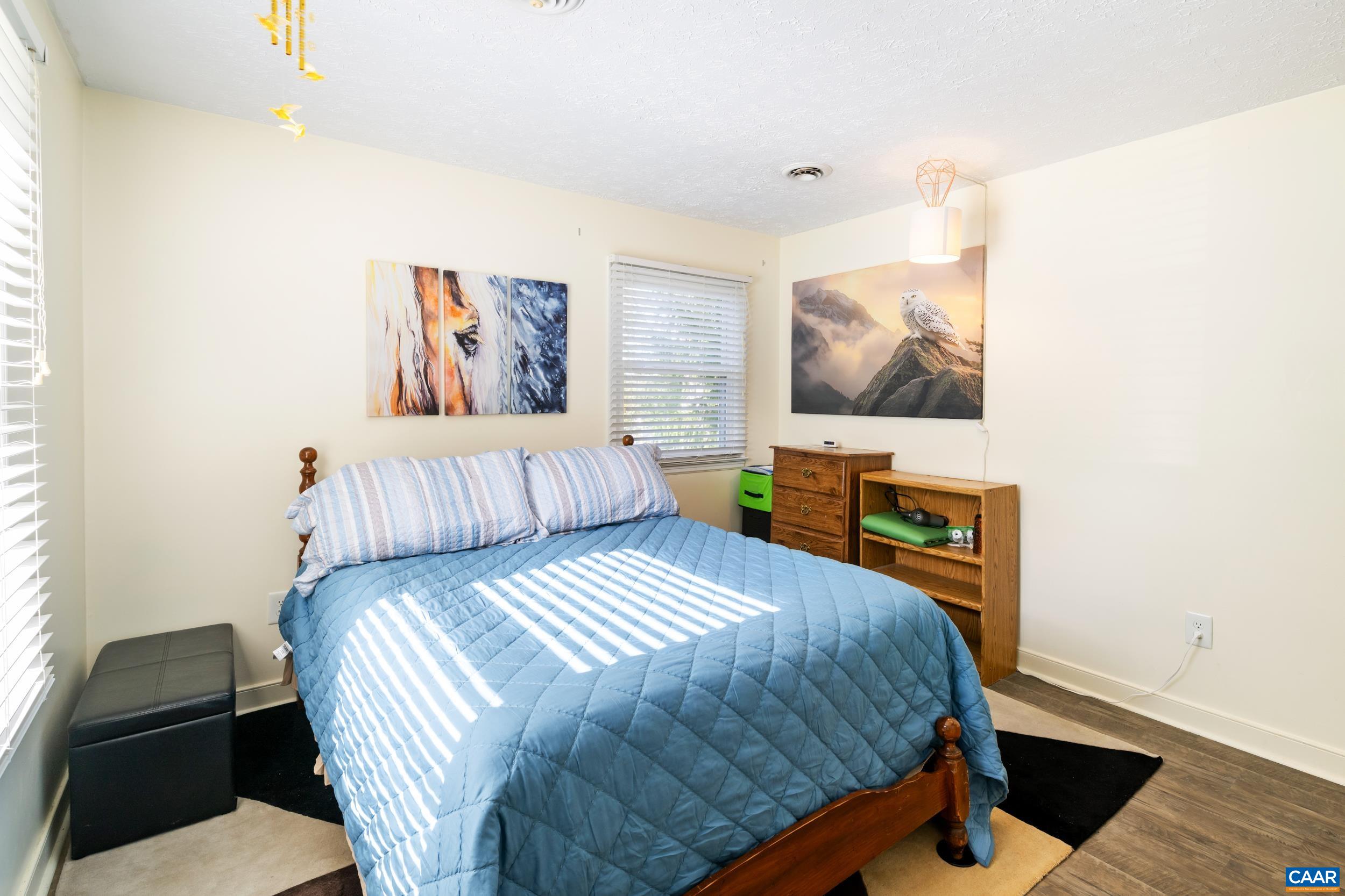 518 Jester Lane Charlottesville, VA 22911 - Photo 25 of 53 a bedroom with a bed and a desk