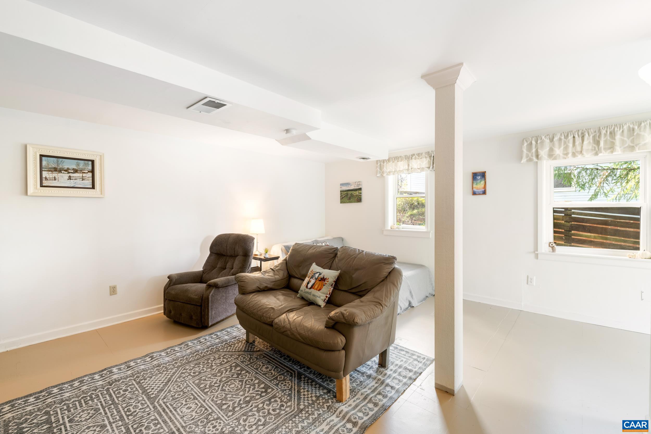 518 Jester Lane Charlottesville, VA 22911 - Photo 33 of 53 a living room with furniture and a window