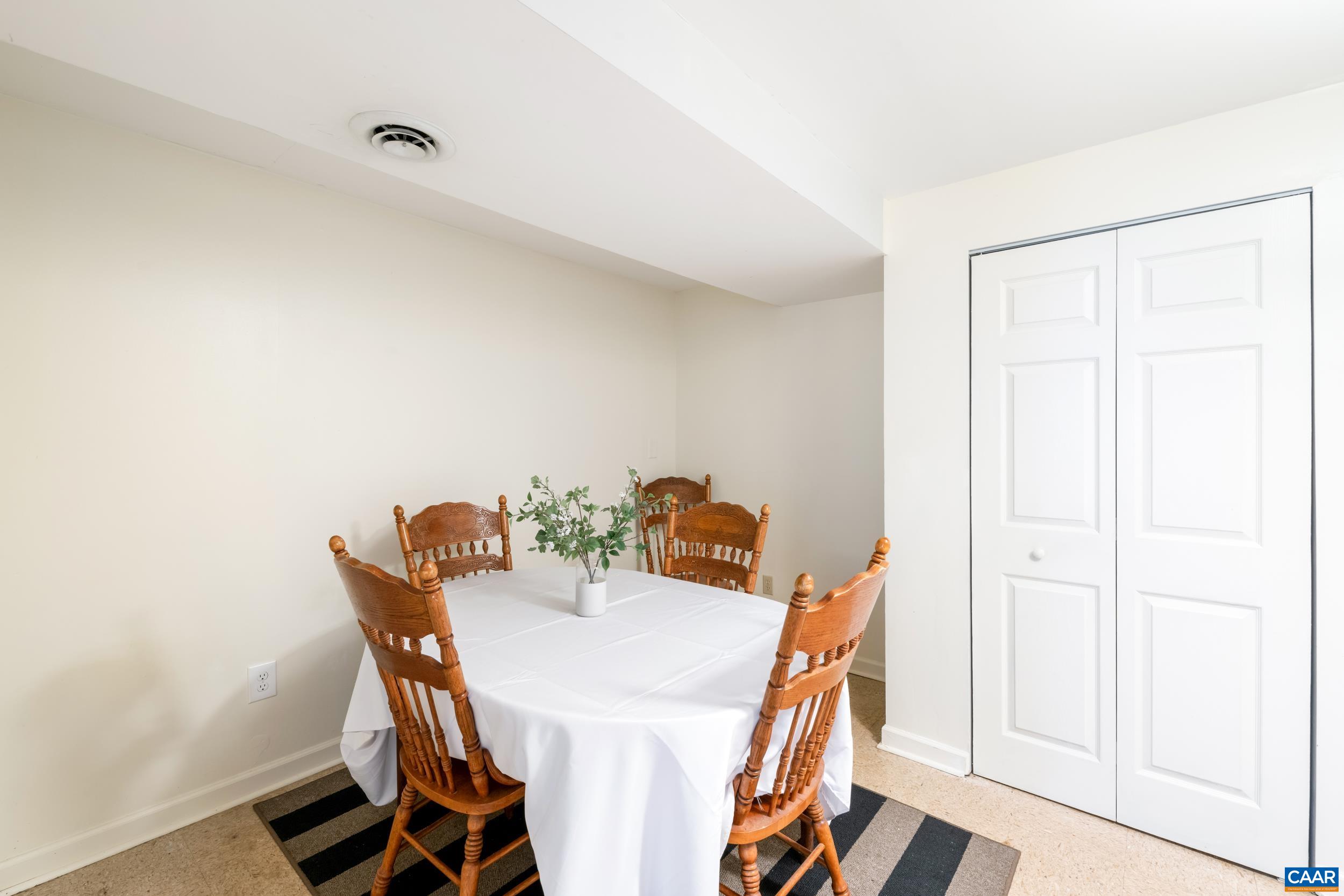 518 Jester Lane Charlottesville, VA 22911 - Photo 39 of 53 a view of a dining room with furniture and a chandelier