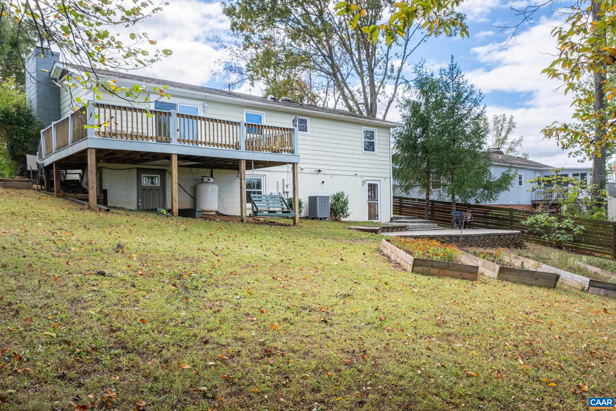 518 Jester Lane Charlottesville, VA 22911 - Photo 46 of 53 a view of house with yard outdoor seating and barbeque oven