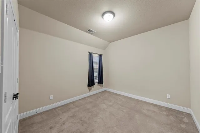 an empty room with an entryway