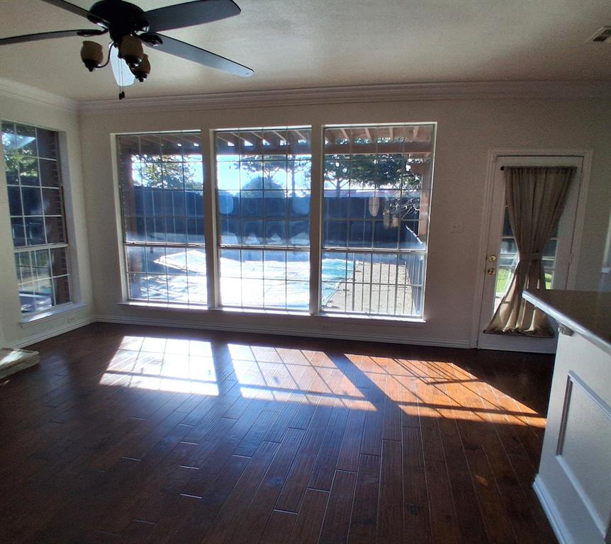 1123 Hampton Drive Allen, TX 75013 - Photo 17 of 33 a view of an empty room with a window