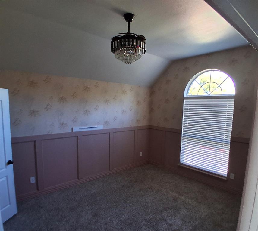 1123 Hampton Drive Allen, TX 75013 - Photo 23 of 33 a view of an empty room and a window