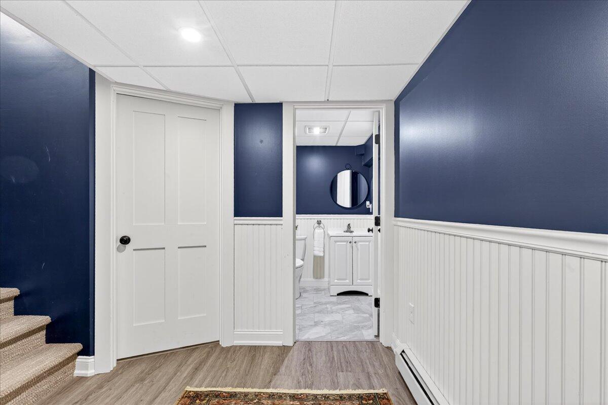 22 Royall Point Road Yarmouth, ME 04096 - Photo 75 of 106 Basement media room toward powder room