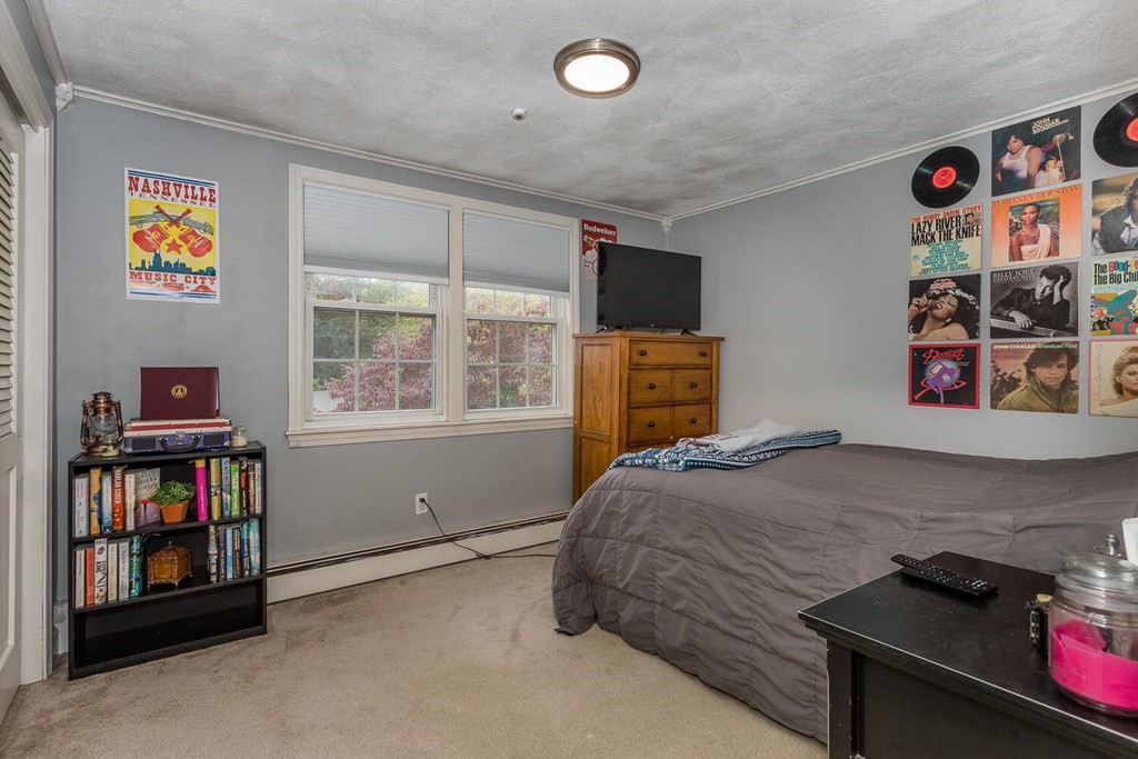 34 Fairview Road Canton, MA 02021 - Photo 14 of 23 a bedroom with a bed and a window