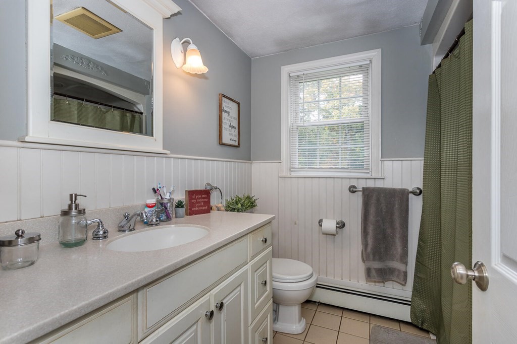 34 Fairview Road Canton, MA 02021 - Photo 15 of 23 a bathroom with a granite countertop sink toilet and shower
