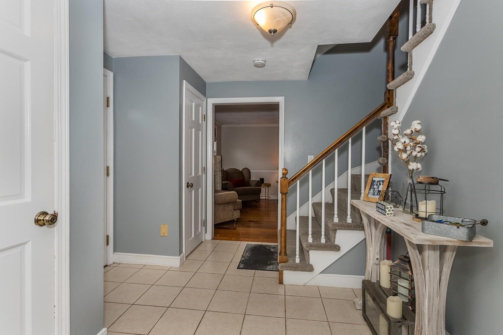 34 Fairview Road Canton, MA 02021 - Photo 3 of 23 a view of entryway and hall with a workspace