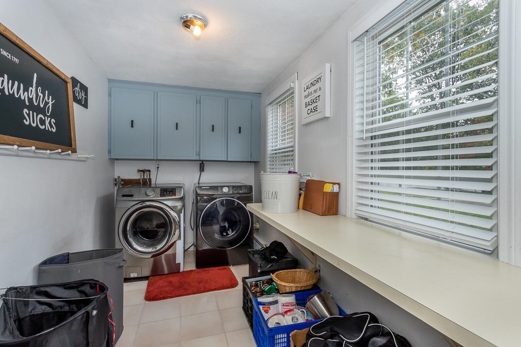 34 Fairview Road Canton, MA 02021 - Photo 9 of 23 a view of a storage and utility room with washer and dryer