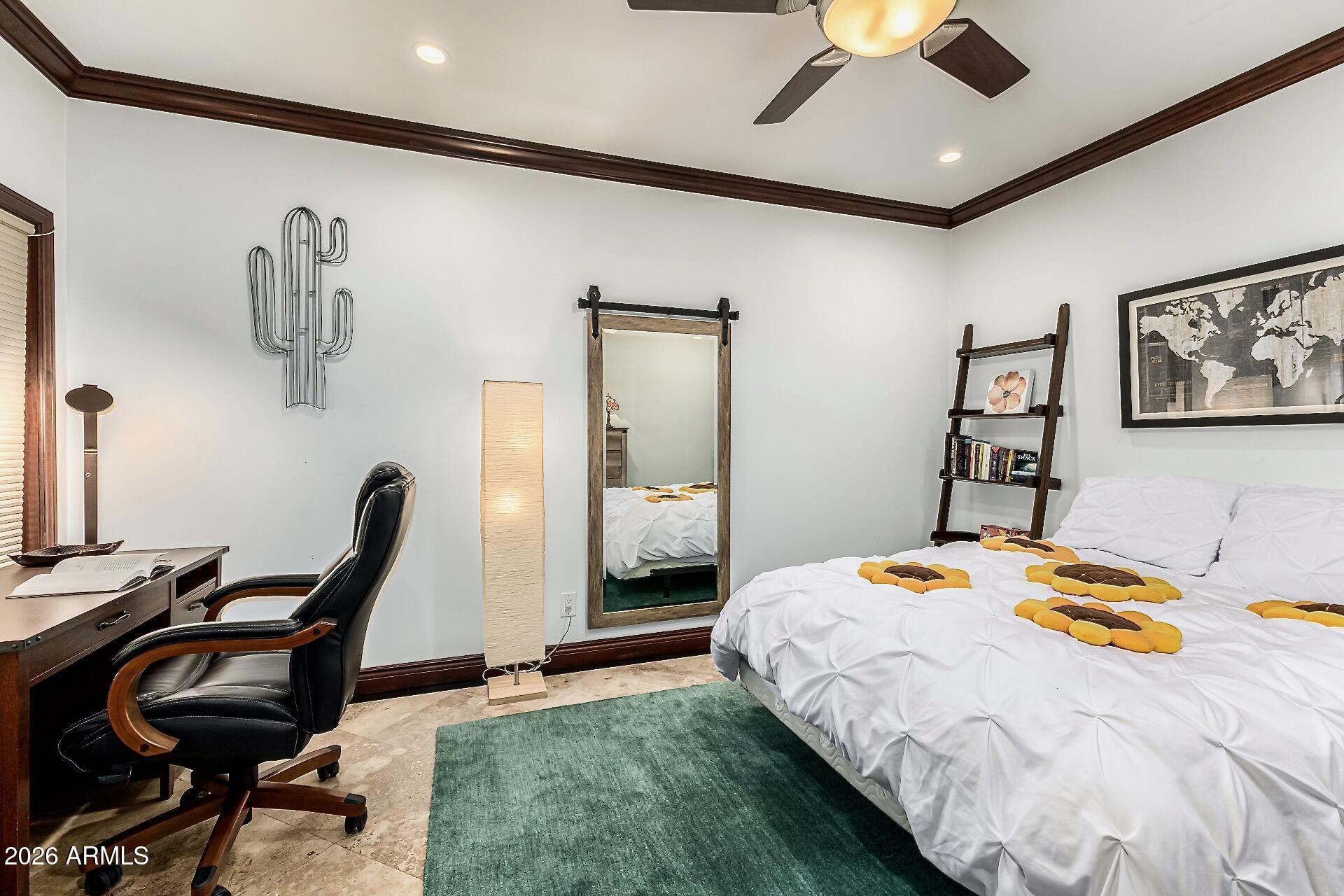 5760 North Scottsdale Road Paradise Valley, AZ 85253 - Photo 16 of 34 a bedroom with a bed a desk and chair
