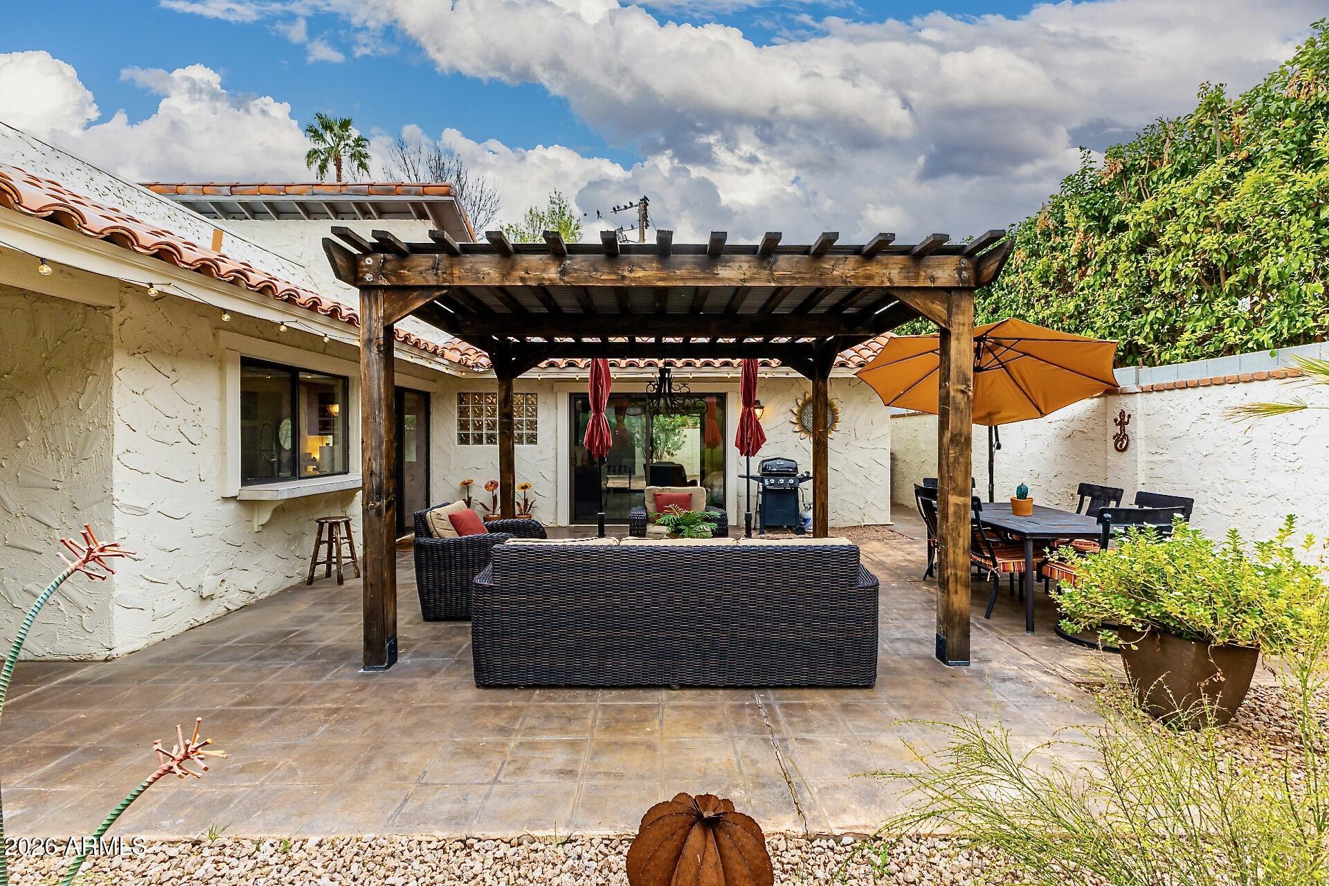5760 North Scottsdale Road Paradise Valley, AZ 85253 - Photo 21 of 34 a view of a terrace with sitting area