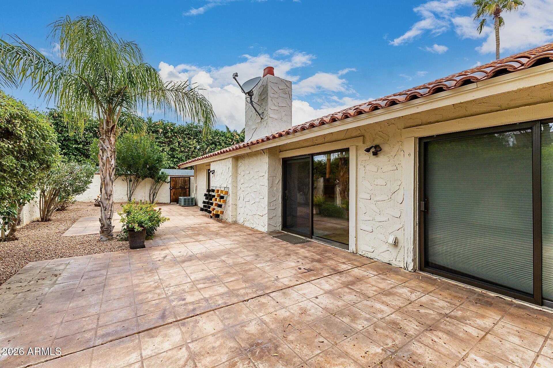 5760 North Scottsdale Road Paradise Valley, AZ 85253 - Photo 24 of 34 a view of a house with a patio